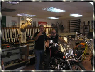 Harley Davidson at a gun shop